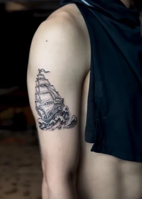 Fine-line tattoo arm detail at the studio